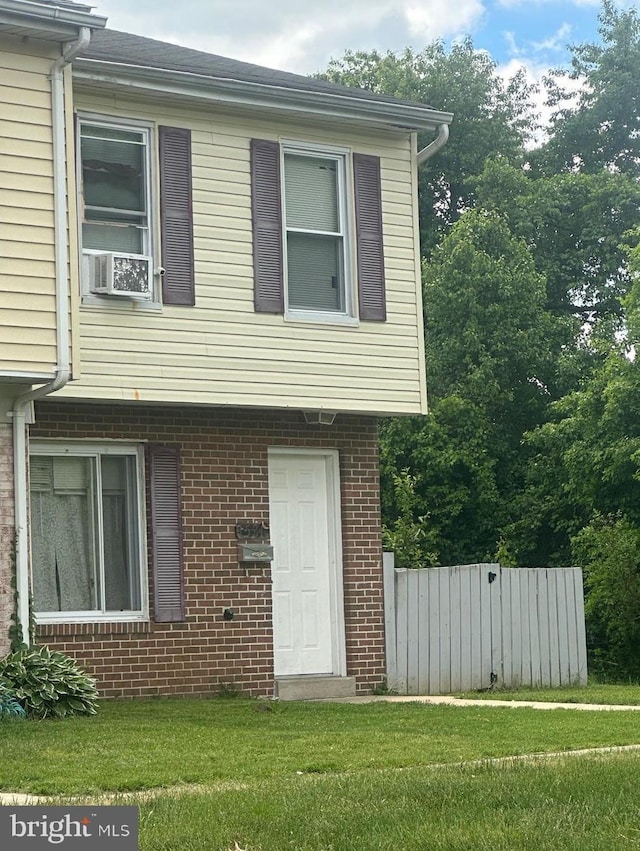 1521 Charlestown Dr, Edgewood, MD 21040 - view of front facade featuring a front yard, brick siding, and cooling unit