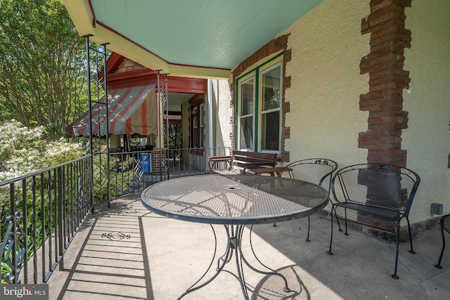 view of patio / terrace featuring a balcony