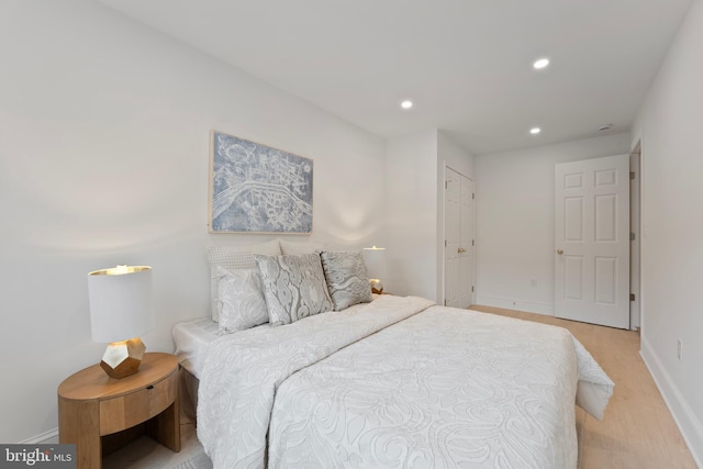 bedroom with baseboards and recessed lighting