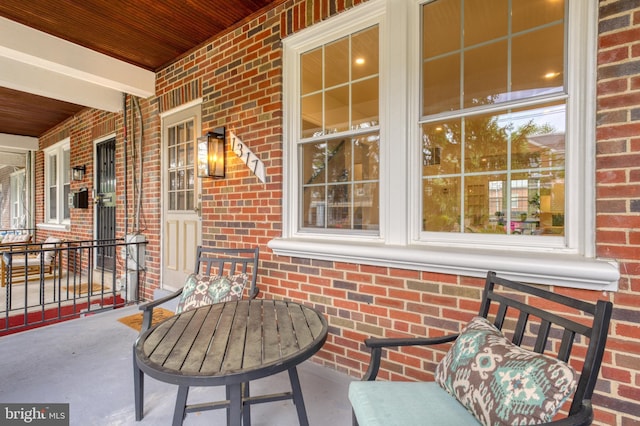 view of patio featuring a porch