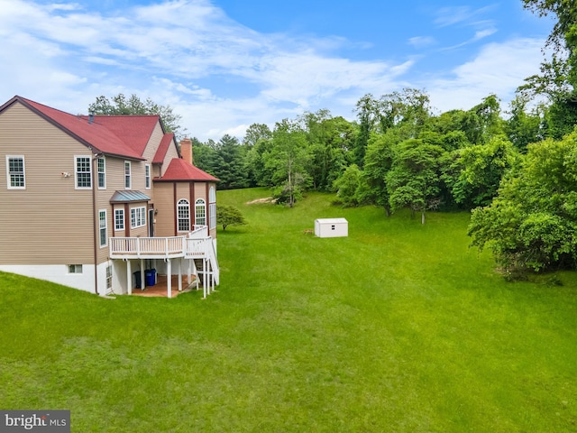 601 James Ridge Rd, Bowie, MD 20721 - view of green lawn with a wooden deck