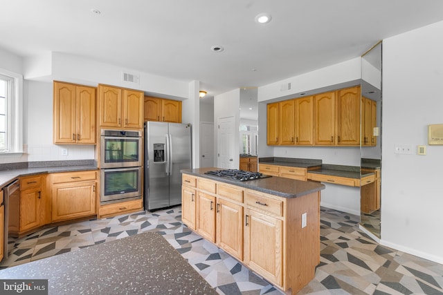 601 James Ridge Rd, Bowie, MD 20721 - kitchen with stainless steel appliances, light flooring, a kitchen island, healthy amount of natural light, and recessed lighting