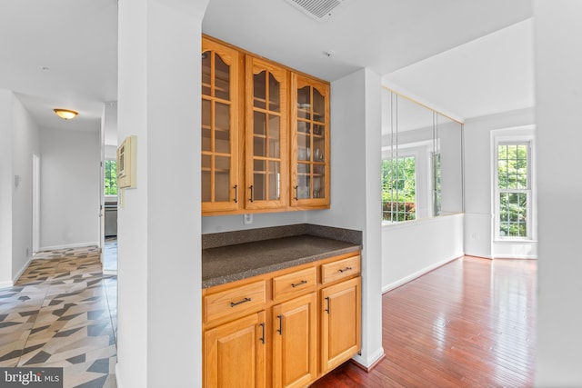 601 James Ridge Rd, Bowie, MD 20721 - bar with baseboards and arched walkways