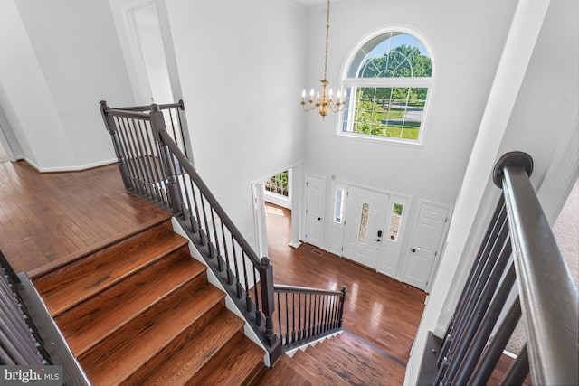 601 James Ridge Rd, Bowie, MD 20721 - entrance foyer featuring a high ceiling, a chandelier, wood-type flooring, and baseboards