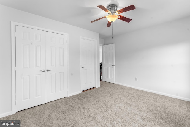 601 James Ridge Rd, Bowie, MD 20721 - unfurnished bedroom with carpet flooring, baseboards, a closet, and ceiling fan