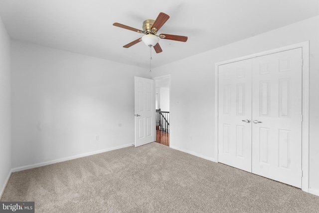601 James Ridge Rd, Bowie, MD 20721 - unfurnished bedroom featuring carpet floors, baseboards, a closet, and ceiling fan