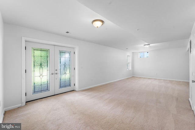 601 James Ridge Rd, Bowie, MD 20721 - unfurnished room featuring french doors, light colored carpet, baseboards, and healthy amount of natural light