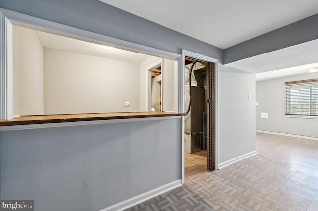 empty room with baseboards