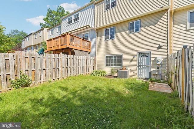rear view of property with central air condition unit