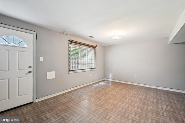entryway featuring healthy amount of natural light and baseboards