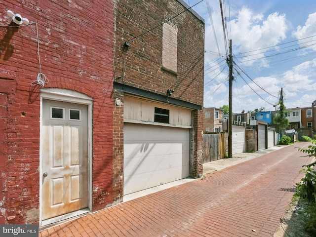 624 14th St NE, Washington, DC 20002 - view of side of property featuring brick siding and a residential view