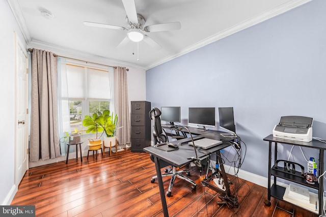 home office with a ceiling fan, ornamental molding, wood finished floors, and baseboards