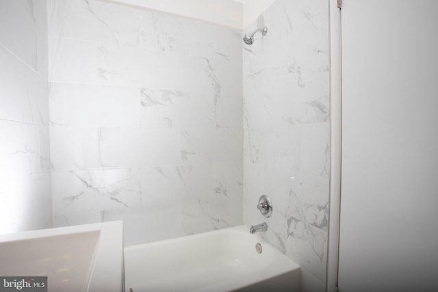 bathroom featuring  shower combination