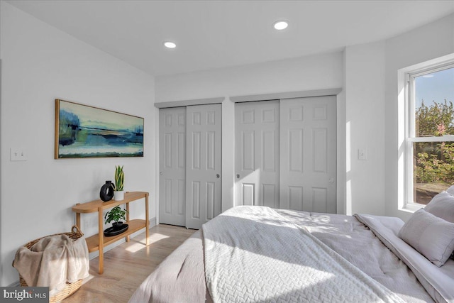 1452 N Felton St, Philadelphia, PA 19151 - bedroom with recessed lighting, light wood-style flooring, multiple closets, and multiple windows