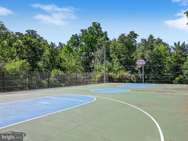 view of sport court featuring community basketball court and fence
