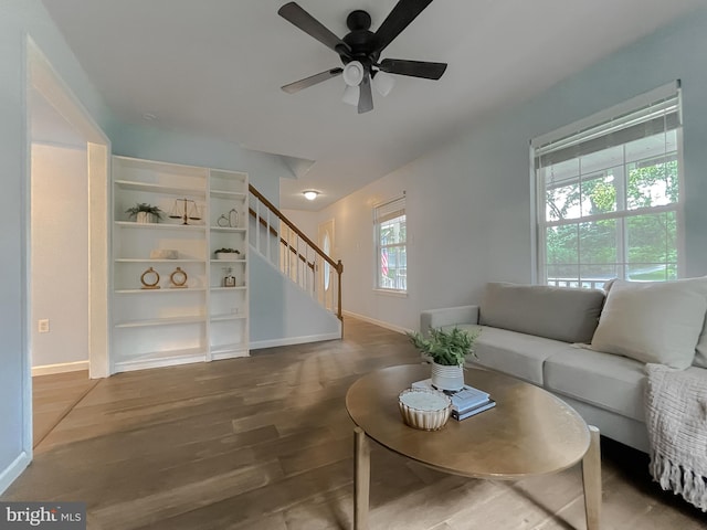 411 N Ln, Prince Frederick, MD 20678 - living area featuring stairway, wood finished floors, baseboards, and ceiling fan