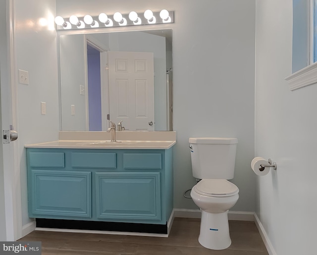 411 N Ln, Prince Frederick, MD 20678 - bathroom featuring toilet, vanity, and baseboards