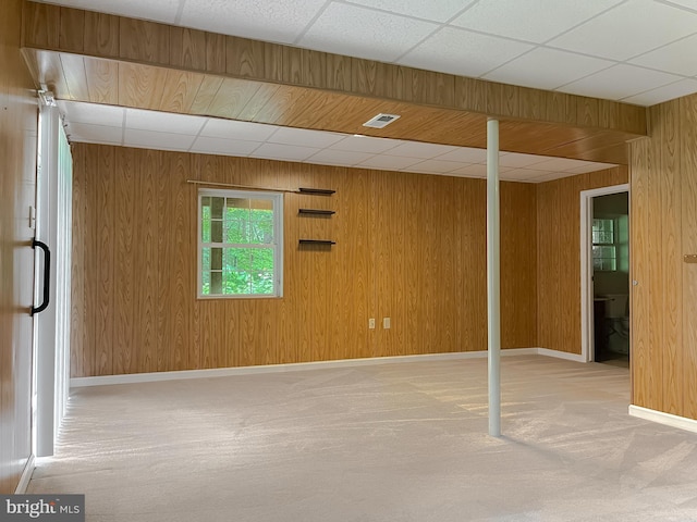 411 N Ln, Prince Frederick, MD 20678 - below grade area featuring carpet, wooden walls, a paneled ceiling, and baseboards