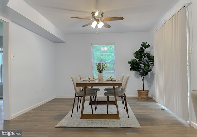 411 N Ln, Prince Frederick, MD 20678 - dining space with a ceiling fan, wood finished floors, and baseboards
