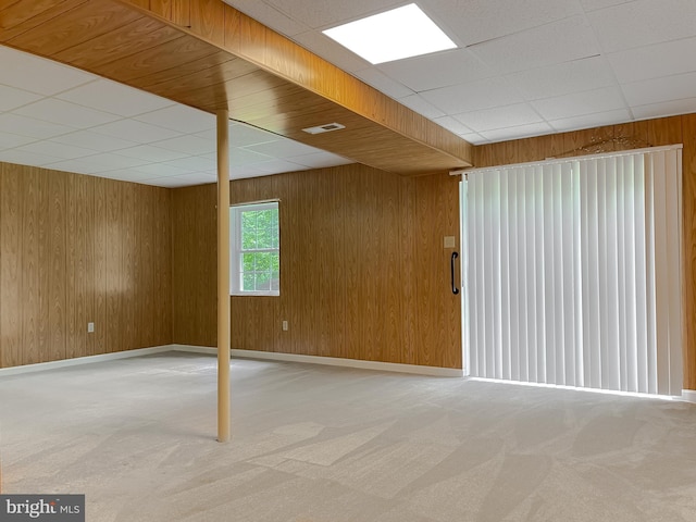 411 N Ln, Prince Frederick, MD 20678 - carpeted spare room with a drop ceiling, wooden walls, and baseboards