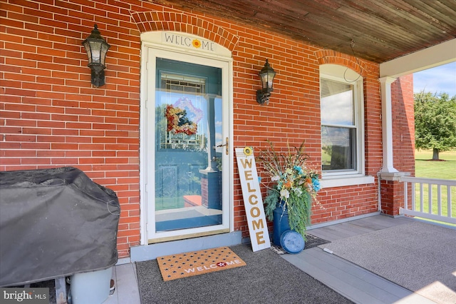 2050 Legion Rd, Clearfield, PA 16830 - doorway to property featuring covered porch and brick siding