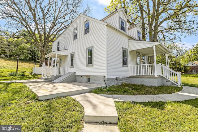 7371 Mountain Laurel Rd, Boonsboro, MD 21713 - view of front of house featuring covered porch and a front yard