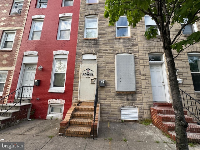 1505 Ramsay St, Baltimore, MD 21223 - townhome / multi-family property featuring entry steps and stone siding