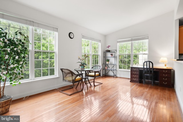 11404 Ramsburg Ct, North Potomac, MD 20878 - sitting room featuring light wood-style flooring, lofted ceiling, and baseboards