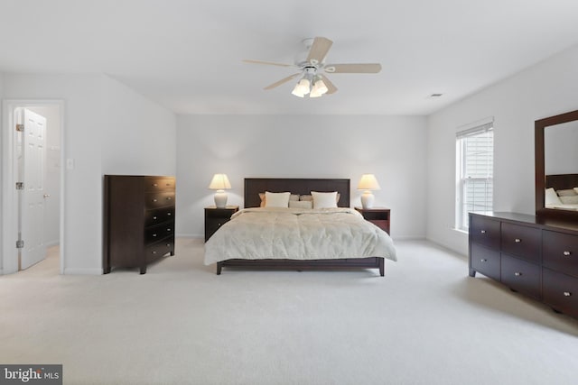 11404 Ramsburg Ct, North Potomac, MD 20878 - bedroom with light carpet, baseboards, and ceiling fan