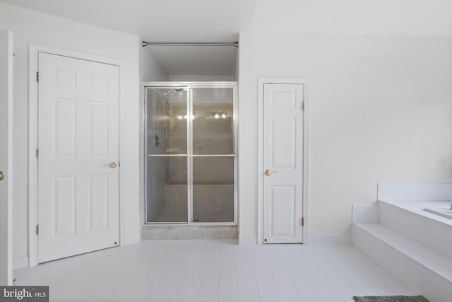 11404 Ramsburg Ct, North Potomac, MD 20878 - bathroom with a shower stall, a bath, baseboards, and tile patterned flooring