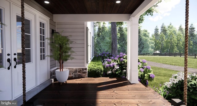wooden terrace with french doors and covered porch