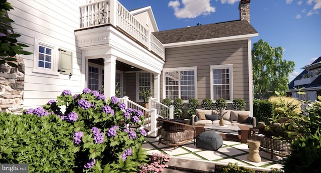 exterior space featuring an outdoor living space and a balcony