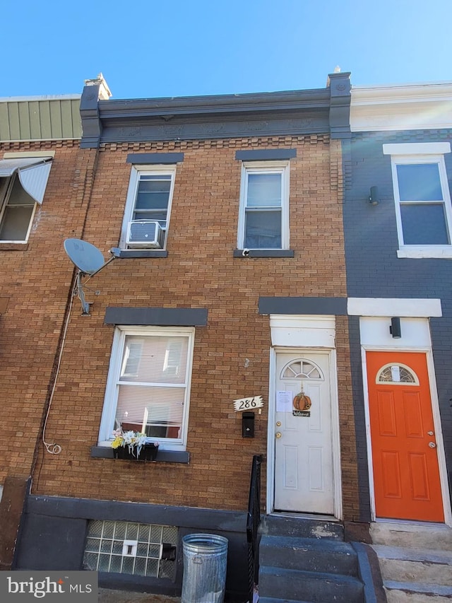 multi unit property featuring brick siding