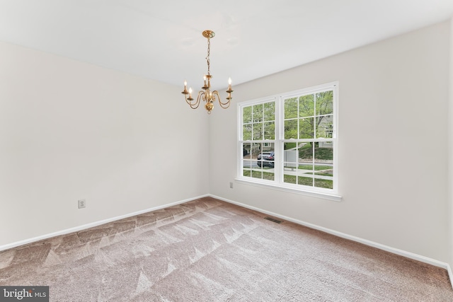 493 Stoneglen St, Collegeville, PA 19426 - carpeted empty room with baseboards, a notable chandelier, and visible vents