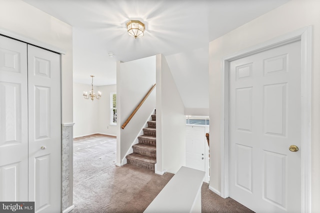493 Stoneglen St, Collegeville, PA 19426 - carpeted foyer entrance with baseboards, stairs, and a notable chandelier