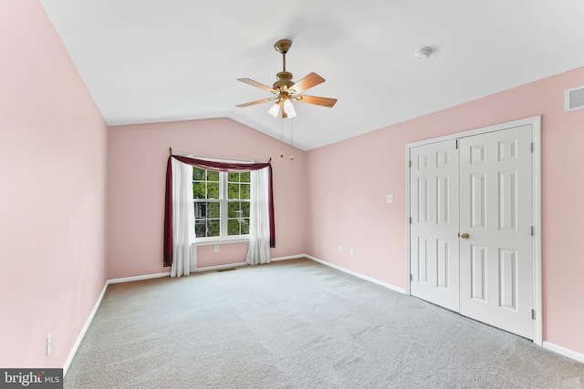 493 Stoneglen St, Collegeville, PA 19426 - unfurnished bedroom with carpet floors, a closet, visible vents, baseboards, and vaulted ceiling