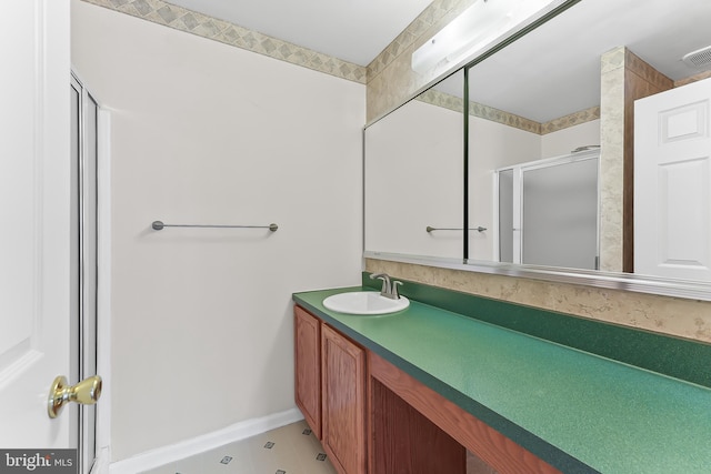 493 Stoneglen St, Collegeville, PA 19426 - bathroom with a shower with shower door, vanity, tile patterned floors, baseboards, and visible vents