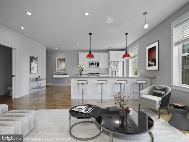 106-12 W Jefferson St Unit 2, Philadelphia, PA 19122 - living area with wood finished floors, baseboards, and recessed lighting