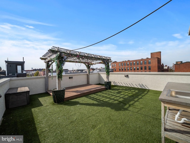 106-12 W Jefferson St Unit 2, Philadelphia, PA 19122 - view of yard featuring a pergola and a deck
