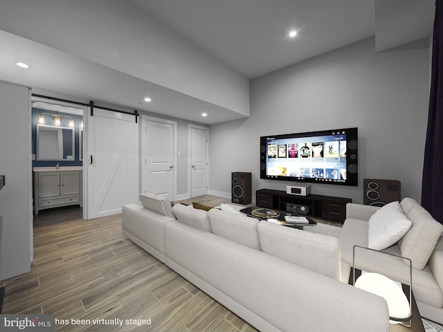 106-12 W Jefferson St Unit 2, Philadelphia, PA 19122 - living room featuring recessed lighting, a barn door, baseboards, and wood finished floors