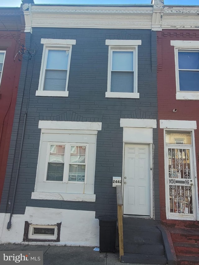 multi unit property featuring brick siding