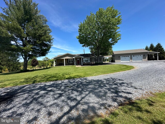 111 Heron Ln, Augusta, WV 26704 - ranch-style home with driveway, an attached garage, and a front yard