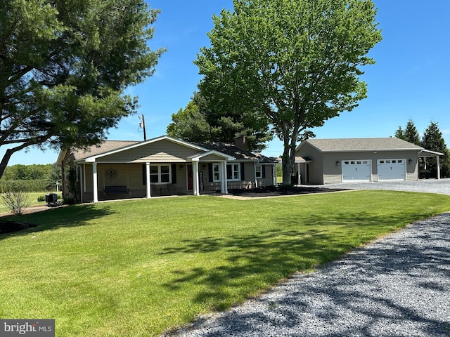 111 Heron Ln, Augusta, WV 26704 - view of front of house with driveway, a porch, a front yard, and a garage