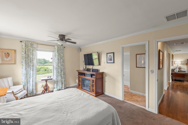 111 Heron Ln, Augusta, WV 26704 - carpeted bedroom featuring ornamental molding, baseboards, and ceiling fan