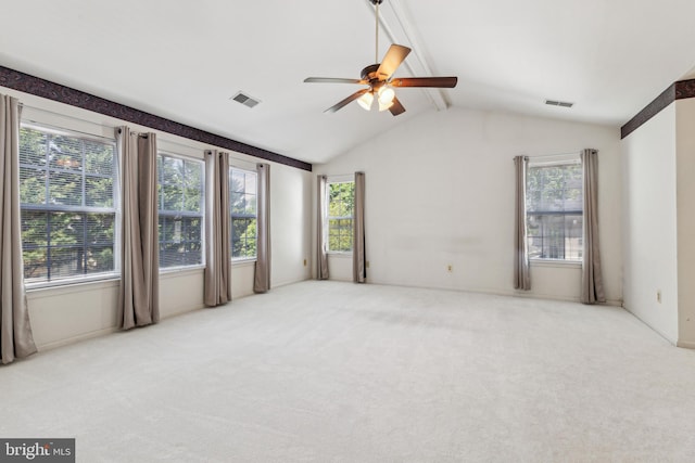 spare room featuring a ceiling fan and carpet