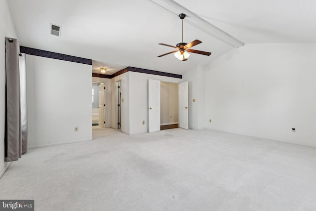 unfurnished bedroom featuring carpet floors, connected bathroom, and ceiling fan