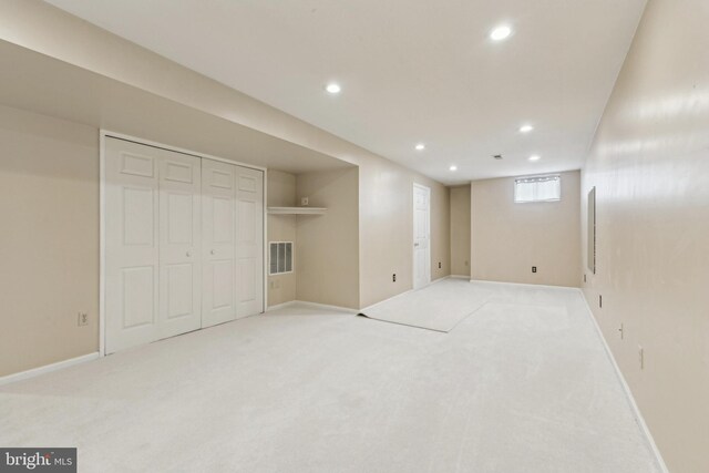 basement with recessed lighting, carpet floors, and baseboards