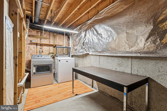 laundry room featuring washing machine and dryer