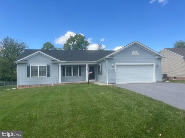 16722 Custer Ct, Williamsport, MD 21795 - ranch-style home with fence, an attached garage, a front yard, a porch, and aphalt driveway