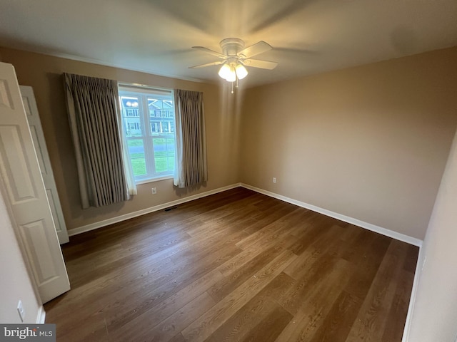 16722 Custer Ct, Williamsport, MD 21795 - empty room with a ceiling fan, dark wood-style flooring, baseboards, and visible vents